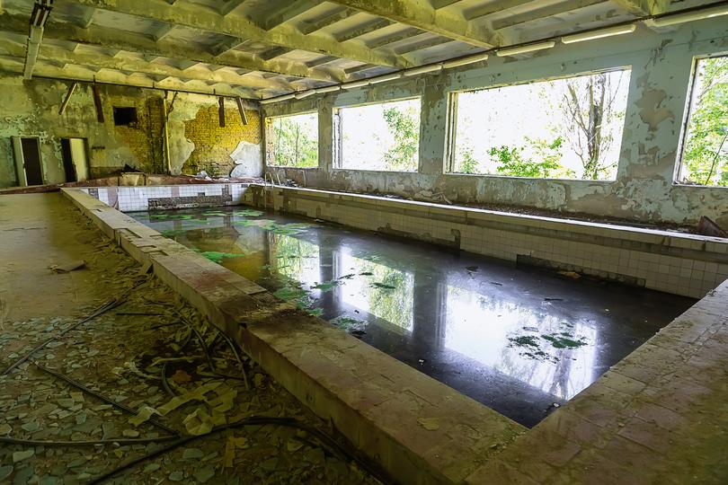 Pool being removed from a backyard