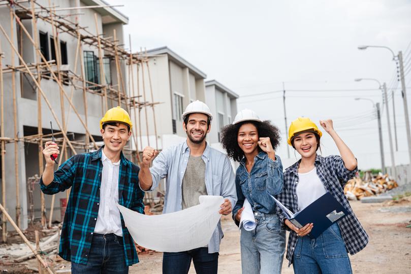 Construction workers building a new house