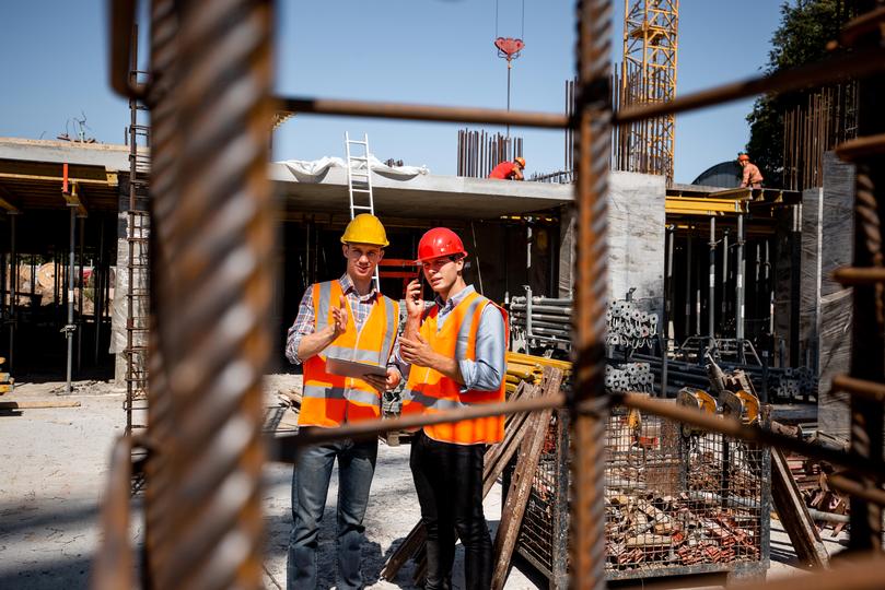 Construction workers building a new house