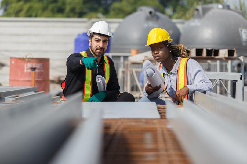 Construction workers building a new house