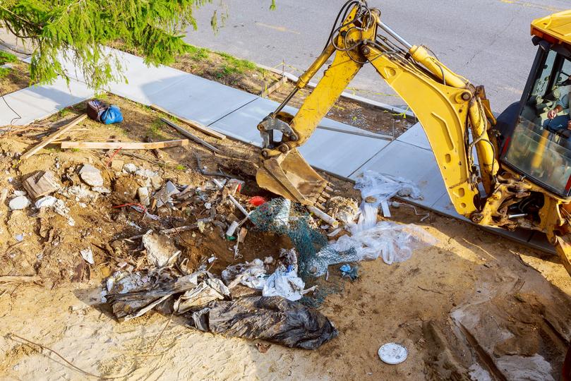 Pool being removed from a backyard